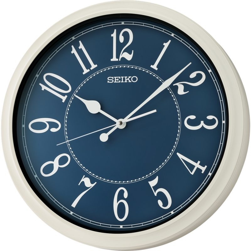 Horloge murale Seiko Contour Effet Bois Blanc Cadran Bleu QXA801-H