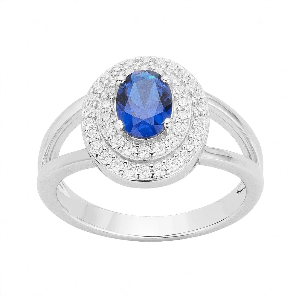 Bague Argent Rhodié 925/1000 Spinelle Bleue Synthétique Forme Ovale et Entourage Deux Rangs Oxydes